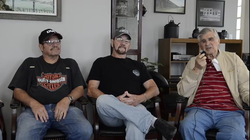 Railroaders seated together inside the Princeton Railroad Museum in 2015